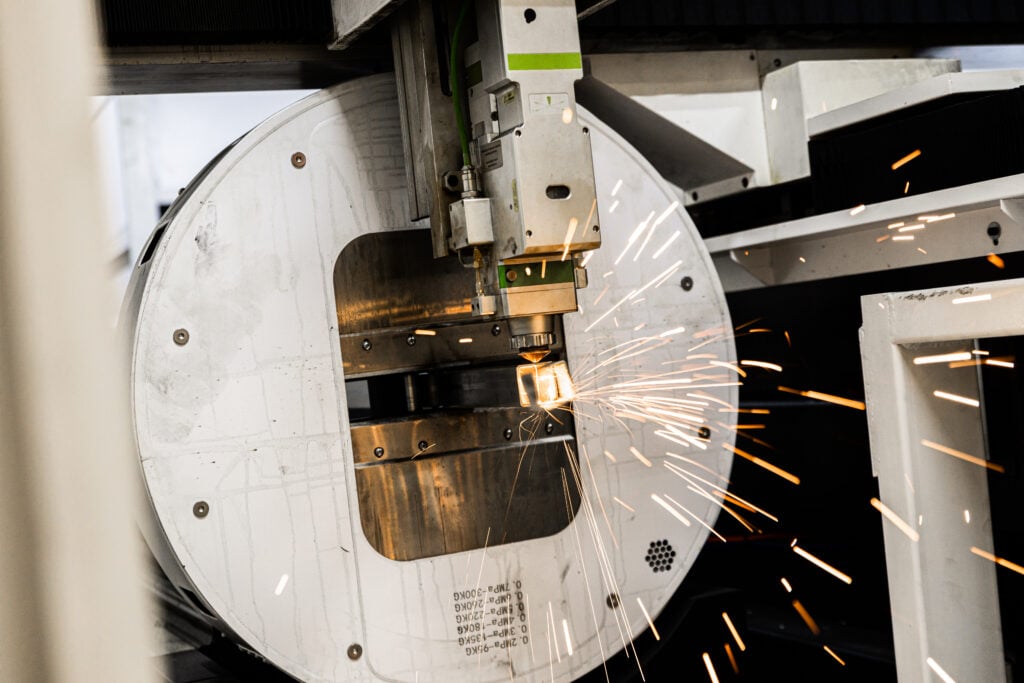 CNC Laser cutting metal square tube.